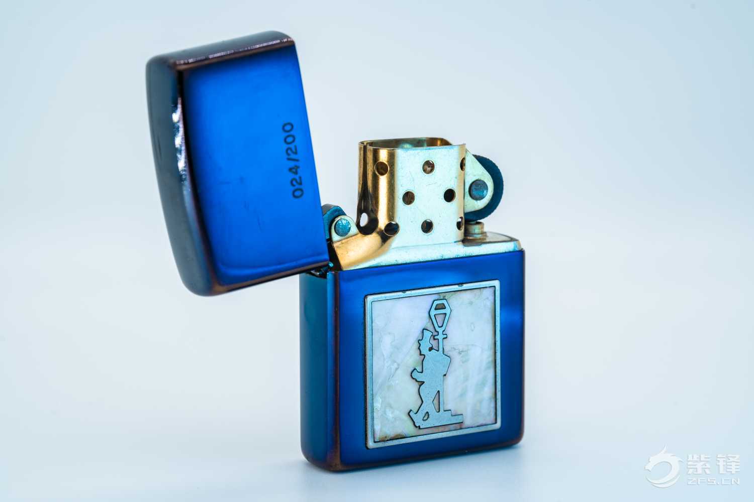 分享一枚貌似比较少见的灯下醉汉贝壳机-晒机交流紫锋-zippo打火机